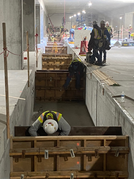 Central tunnel east walkway pit form and pour June 2022