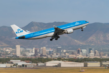 KLM with city and mountains