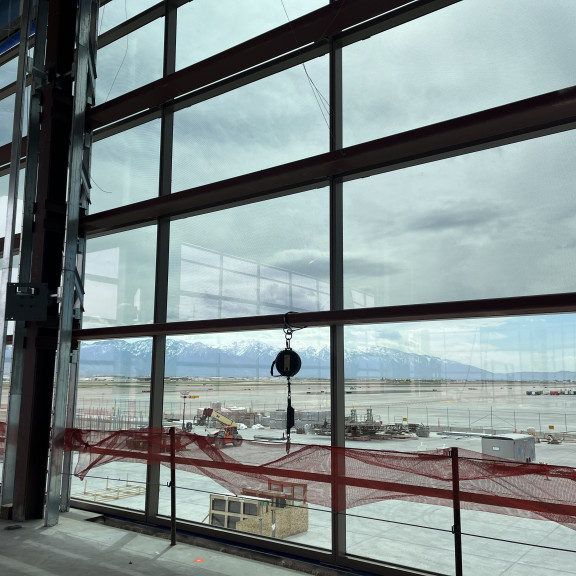 Phase 4 Concourse B east glass curtain April 2025