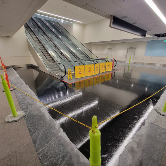 Tunnel terrazzo grind grout polish February 2024